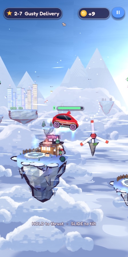 A red mini car flying past a spinning windmill rotor over snowy peaks
